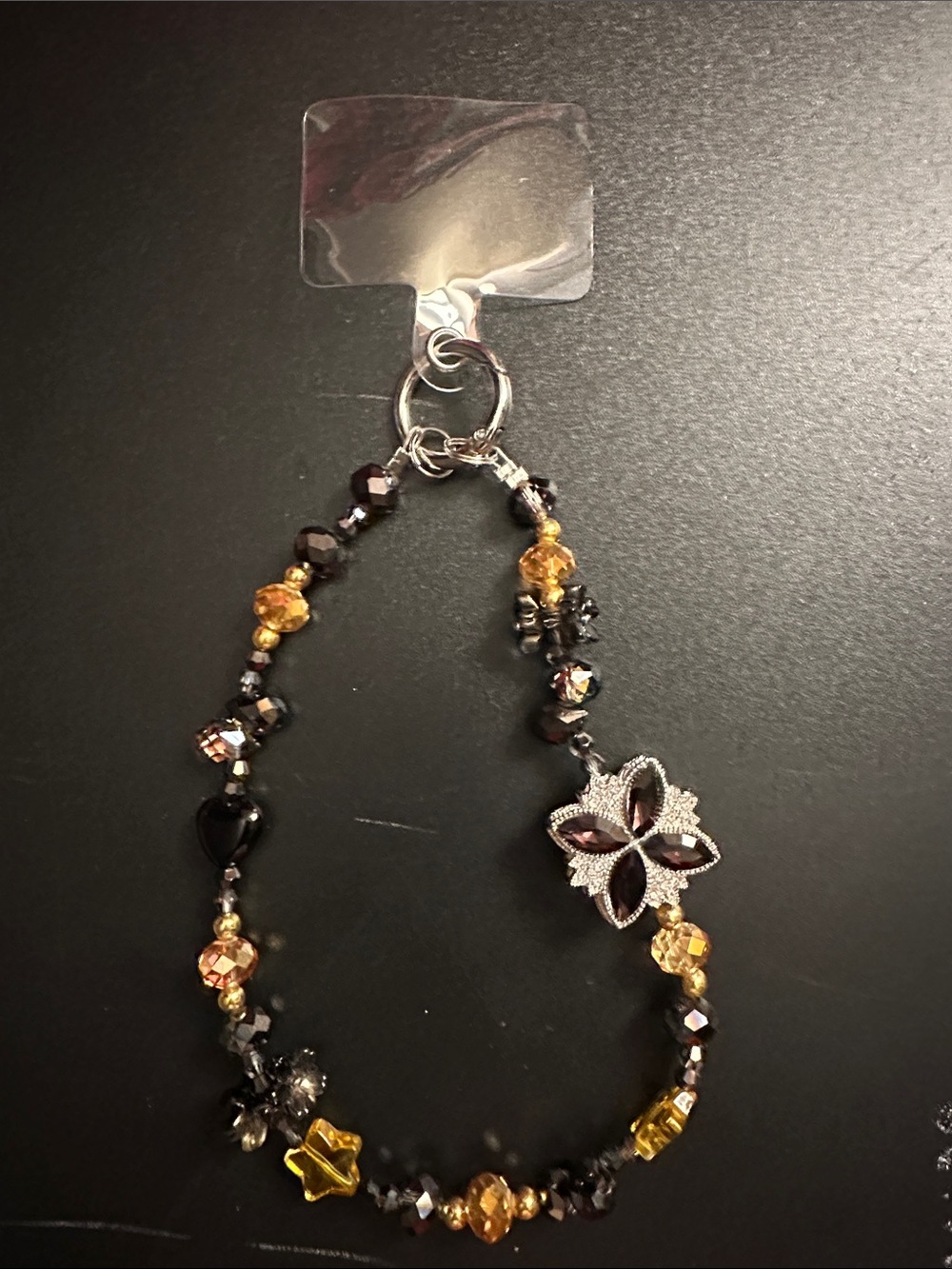 Handmade Black and Gold Beaded Phone Charm with Floral Charm